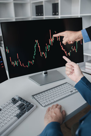 Two investors analyzing the stock market for trading, business man trading stocks for profit, stock...
