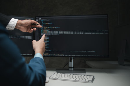 Group of programmers brainstorm together to write programs on the computer, designing programs to meet the needs of users and friendly users, designing programs to help manage work. Programmer conceptの写真素材