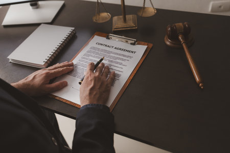 Lawyer sits in office with litigation contract documents, attorneys draft contracts and legal terms...