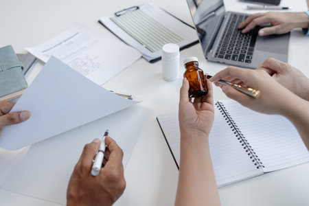 Joint meeting between doctors and administrators, meeting summarizing the prescription of medicines and importing medicines for use in hospitals, meeting to discuss together. Doctor meeting concept.の写真素材