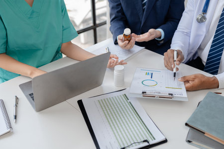 Joint meeting between doctors and administrators, meeting summarizing the prescription of medicines and importing medicines for use in hospitals, meeting to discuss together. Doctor meeting concept.の写真素材