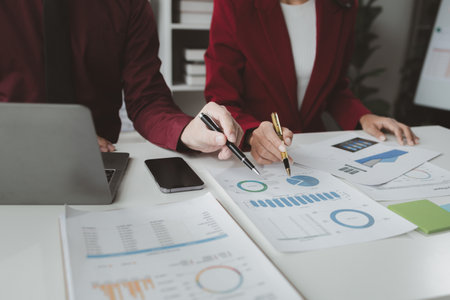 Start-up company meetings, brainstorming meetings to plan business strategies, creating flowcharts for systematic and step-by-step work. System planning concepts and flowchart preparation.の写真素材