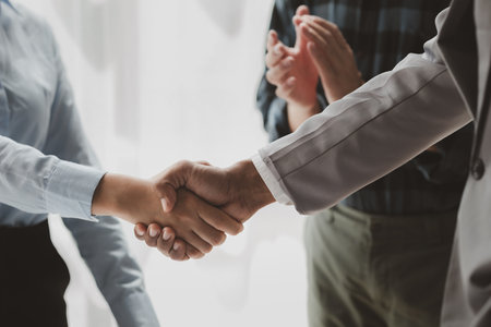 Make agreements with business partners, Success in negotiating and entering into business contracts, Meeting commitments in a meeting room at the office, business idea.の写真素材