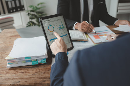 Presenting market reports, Meeting to summarize the financial condition of the company, Sit and discuss various reports in the conference room together, meeting idea.の写真素材