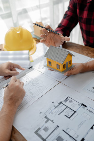 Design blueprints for use in structural work, Draw structural of buildings at the meeting and...