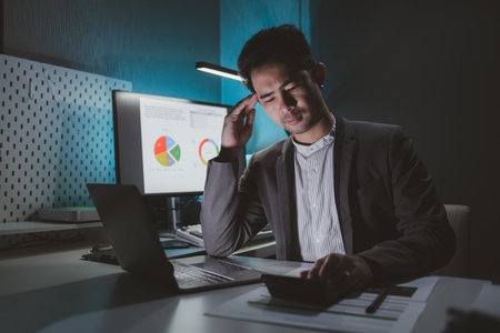 Entrepreneur is getting tired of their work,  Businessman is stressed about managing a startup company, Company employees are stressed because their laptops are having problems, stress idea.の写真素材