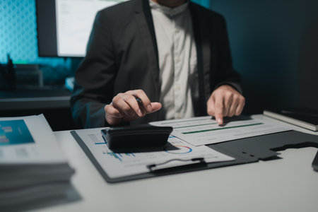 Calculating the currency for account transfer, Currently analyzing investment possibilities, The accountant is checking the financial liquidity of the company, finance idea.の写真素材