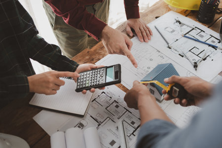 Architects and engineers work together to come up with solutions to house building problems, The...