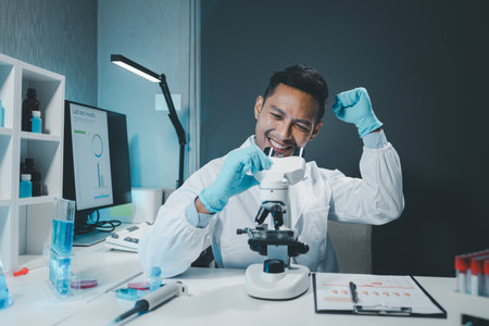 chemist is doing an experiment in the laboratory, A scientist is using a microscope to analyze the chemical composition, A scientific experiment is searching for biological answers in a laboratory,の写真素材