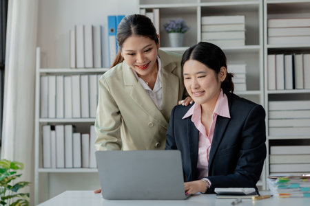 Explaining the report at the meeting, Collaborate to solve problems in the meeting room, Discuss startup business with the team at the office, Work together as a team,の写真素材
