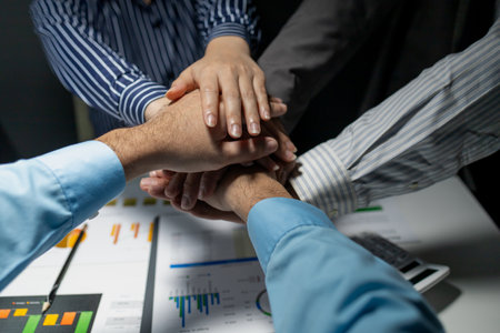 Group with hands together, teamwork, collaboration and unity between business people with their...