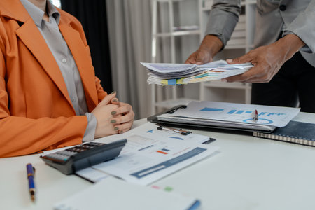 Team of analyst working on financial data analysis dashboard on paper as marketing indication for business strategic planning, Insight, Group of businessmen working together to calculate income,の写真素材