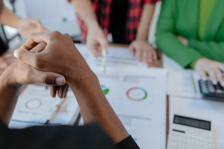 A group of young people join together to form a startup company, Close-up view of the meeting situation in the presentation room, Work together as a team,Business persons on meeting in the office.の写真素材