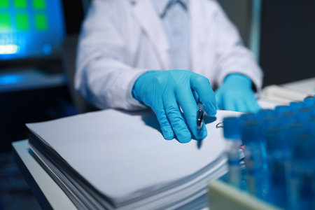 A researcher is taking notes. It is being developed in the lab as a profile for other researchers, A...