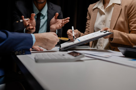A group of employees is meeting to come up with a strategy to increase profits for the company, A...