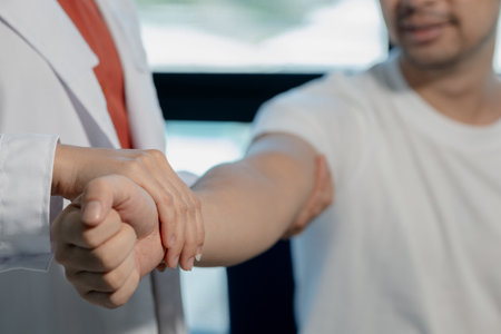 A physical therapist is helping a patient with basic physical therapy to treat specific muscle...