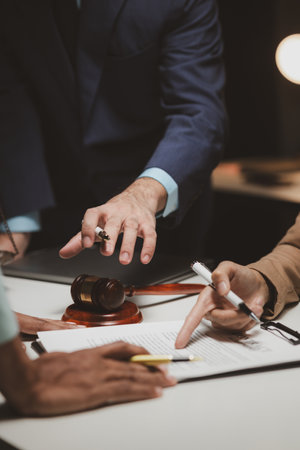 A group of lawyers and clients are discussing the contract they will be signing together in the future, Collaborative brainstorming between lawyers and clientsの写真素材