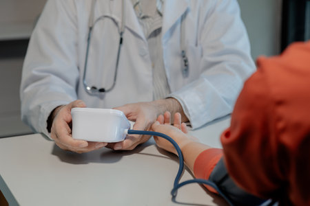 Doctors are giving blood pressure measuring devices to check people's pulses and blood pressures to...