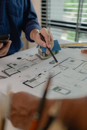 an architect and an engineer are discussing about big projects that they have to take responsibility...