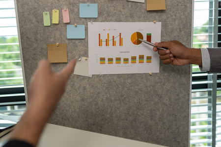 a businessman orders his assistant to rehearse a serious presentation of an important project and not to make any mistakes before a business meeting with a partner soon, brainstorming, discussionの写真素材