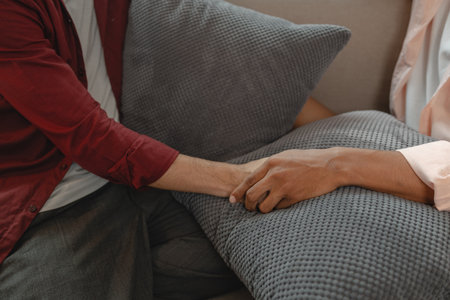 a male couple is very happy spending time together, enjoying their romantic relationship, the two...