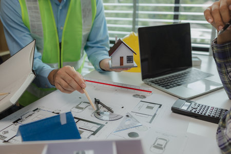A meeting of architects who work hard together to create outstanding work. Engineers and contractors...