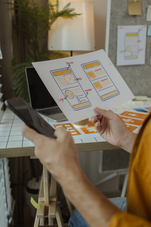 A web developer is analyzing data from his ideas to develop the structure and components of a...