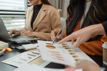 The group of employees are brainstorming to find ways to increase sales of the company's products, The group of business people are practicing their presentation, teamwork, brainstorming, companyの写真素材