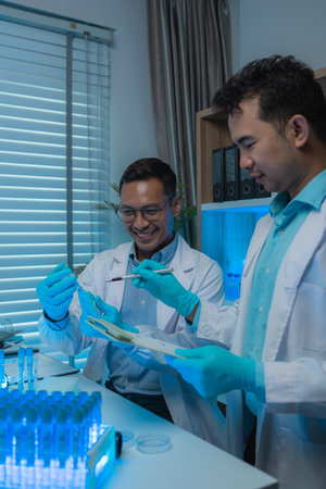 there are a lot of science equipment in the laboratory such as microscope, test tube, scientific...