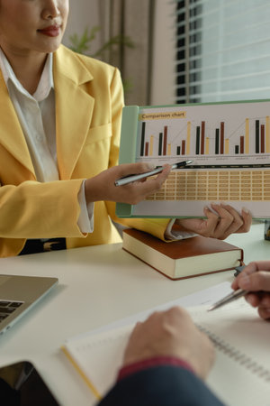 Two colleagues spend most of their time at workplace to meet deadlines, meeting between businessmen...
