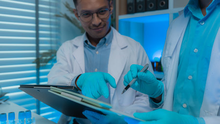 there are a lot of science equipment in the laboratory such as microscope, test tube, scientific...