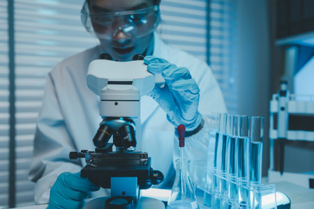 a female scientist is experimenting with chemicals in a lab, science experiments often require a lot...
