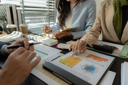 Business people are brainstorming to come up with strategies to increase sales for the company. A...