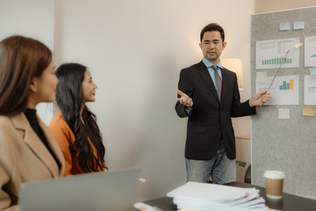 The group of employees are brainstorming to find ways to increase sales of the company's products, The group of business people are practicing their presentation, teamwork, brainstorming, companyの写真素材