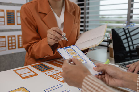 the development team is consulting on the design of the website UX UI, they are working on project...