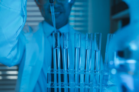 researchers working in the clinical laboratory, scientists working in the lab, science, chemists are working on project of vaccine development, scientists conducting an experimentの写真素材