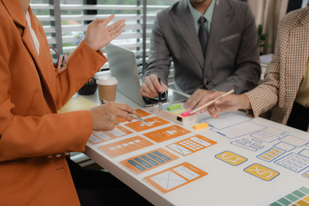 the development team is consulting on the design of the website UX UI, they are working on project...