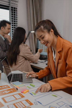 creative planning phone app development template layout, User experience concept, website designer, develop team UX designer working on smartphone application in the officeの写真素材