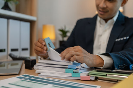 stamped the document to approve, businessman professional working while sitting at office desk,...