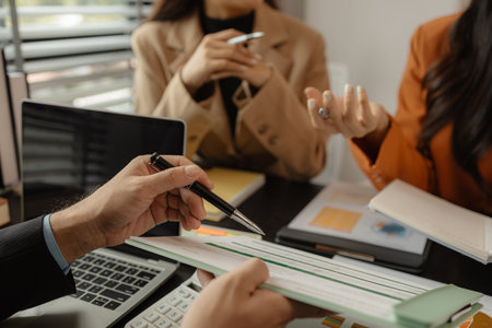 The group of employees are brainstorming to find ways to increase sales of the company's products, The group of business people are practicing their presentation, teamwork, brainstorming, companyの写真素材