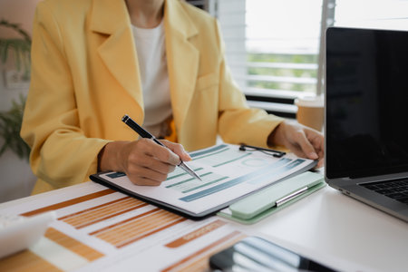 two busy professional executive team business people working together on business finances analysis at office meeting, professional manager consulting corporate clientの写真素材