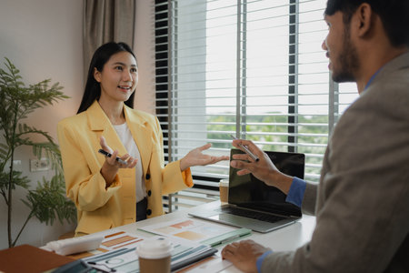 two busy professional executive team business people working together on business finances analysis at office meeting, professional manager consulting corporate clientの写真素材