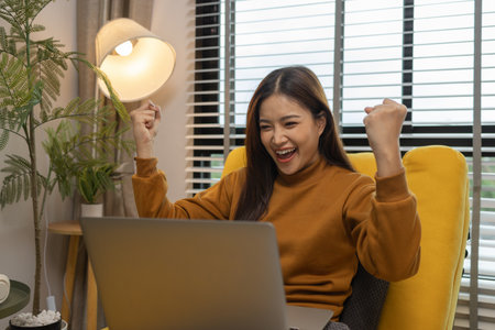 happy and comfortable at home in the morning, young woman relaxing at home, girl resting in her room, enjoy life, rest, relaxation, wellbeing, lifestyle,の写真素材
