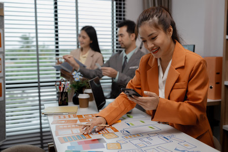 creative planning phone app development template layout, User experience concept, website designer, develop team UX designer working on smartphone application in the officeの写真素材