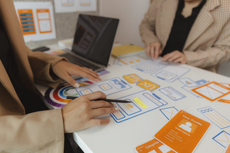 Web designers are working hard to design the appearance of digital products that are colorful,...