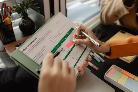 Several employees work together in a company, A group of business people sit together and discuss and exchange ideas about the content of the work, colleagues planning together in the officeの写真素材