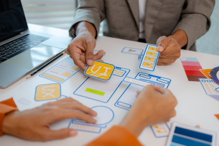 Process of creating an interface for a mobile app, user interface and experience concept, ux, ui, ux developer and ui designer, creative digital development agencyの写真素材