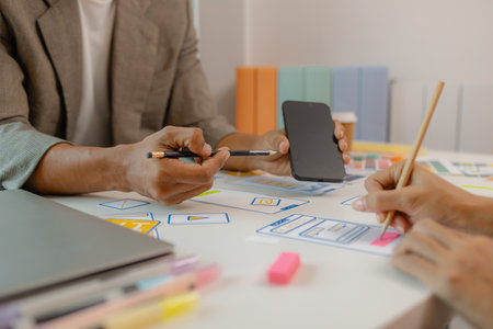 Process of creating an interface for a mobile app, user interface and experience concept, ux, ui, ux developer and ui designer, creative digital development agencyの写真素材