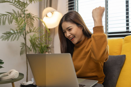 happy and comfortable at home in the morning, young woman relaxing at home, girl resting in her room, enjoy life, rest, relaxation, wellbeing, lifestyle,の写真素材