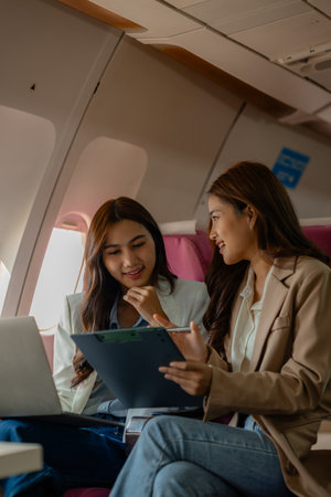 two beautiful businesswomen were traveling by plane to negotiate sales with their business partners...